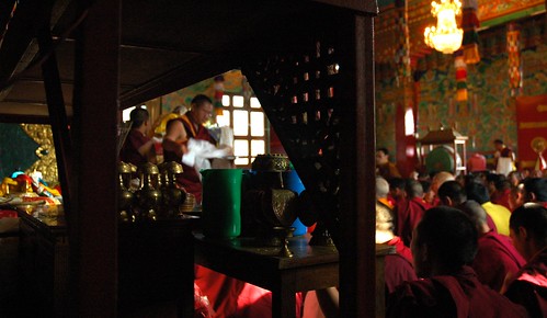Nectar containers under the shrine, view of the shrine room, Sakya Lamdre, lamas, monks, sangha, Sakya Lamdre, Tharlam Monastery of Tibetan Buddhism, Boudha, Kathmandu, Nepal by Wonderlane