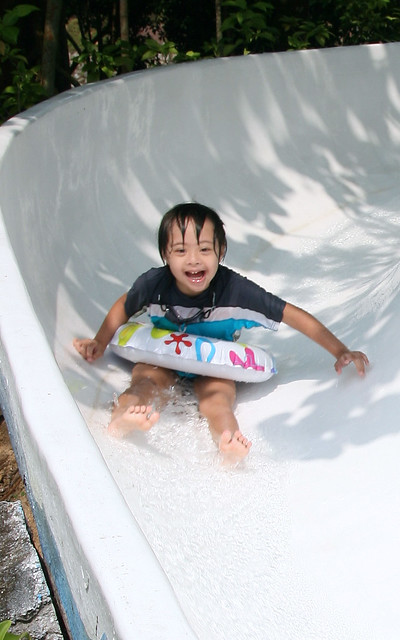 So happy on the water slide!