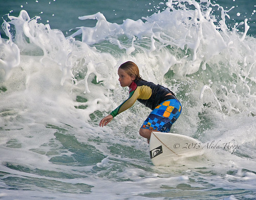 young and surfing by Alida's Photos