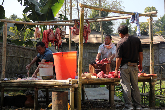 Butchering pigs in Nagaland