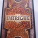 Intrigue card back