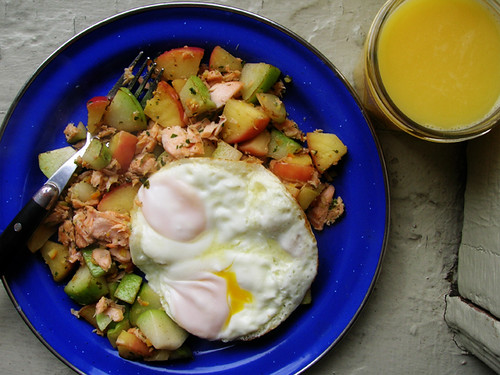 fried eggs on trout, chayote, and apple hash with OJ