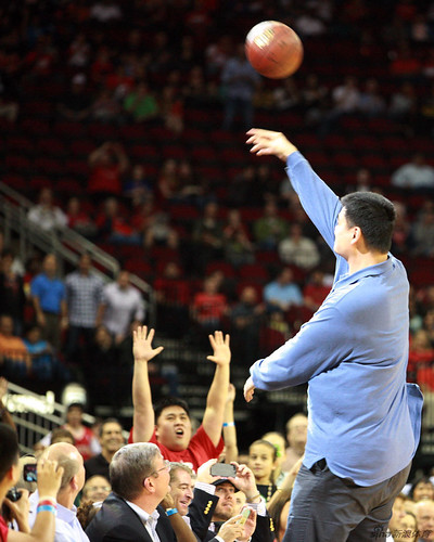 February 8th, 2013 - Yao Ming throws a free ball into the stands at the Rockets-Trailblazers game in Houston
