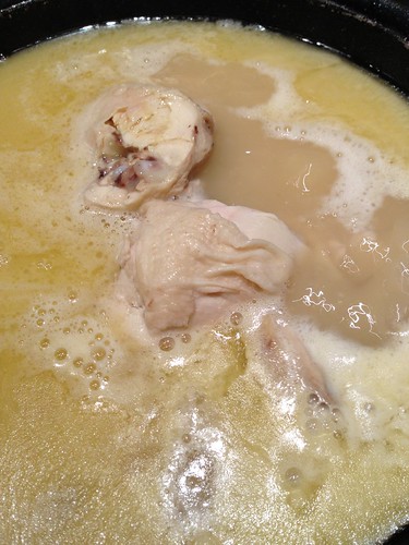 Chicken Chunks within the boiling collagen stock