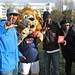 Lewisham rapper Question and Zampa the Lion, Millwall F.C.'s mascot