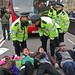 A "die-in" for the NHS, on the road in front of Parliament