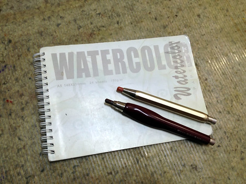 Stephen Dernocoure's sketchbook and pens