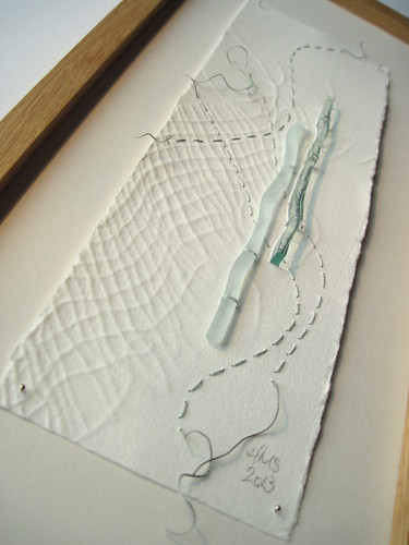 Edges: embossed paper, glass, stitch