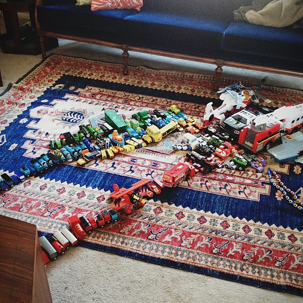 Well that's a fun surprise. Every vehicular toy they own, by color. #butwhoeollcleanitup ?#vscocam