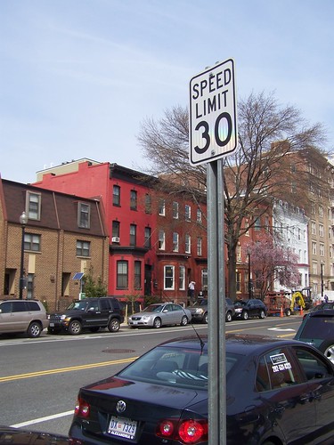 30 mph speed limit sign posted on 11th Street NW