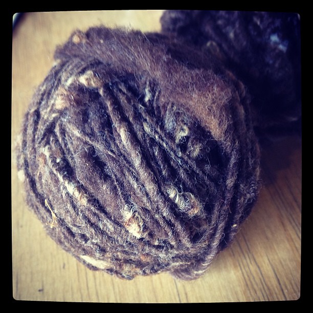 My first-ever knitting student, now 13 yrs old, brought me llama yarn she spun after borrowing my carder. #awesome