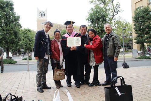 With family, Professor Ando and Uncle Yaw. After my graduation ceremony.