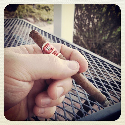 Breaking the porch chair back in with a RyJ Lonsdale #cigar