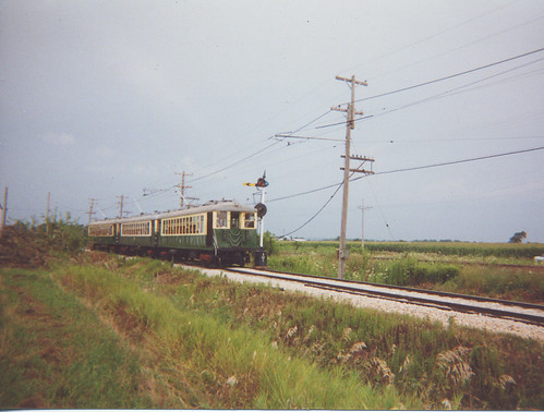 Eastbound CTA 4000 Series rapid transit train racing an approaching thunderstorm.  The Illinois Railway Museum.  Augsut 2000. by Eddie from Chicago