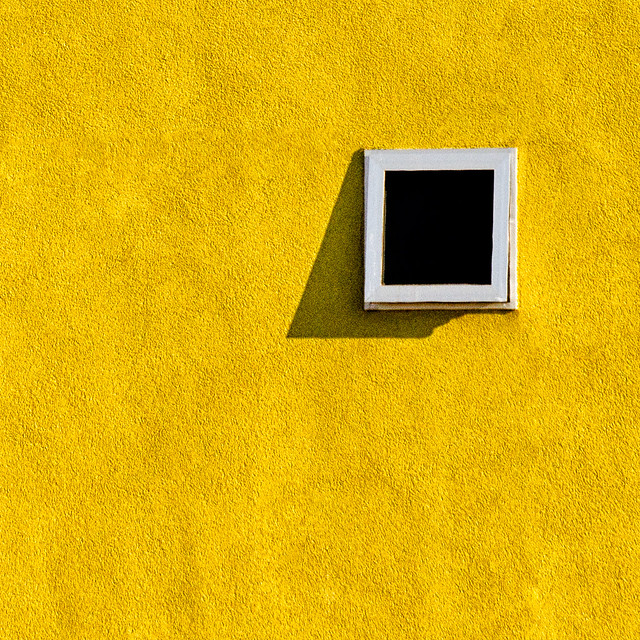 Window in a Yellow Wall