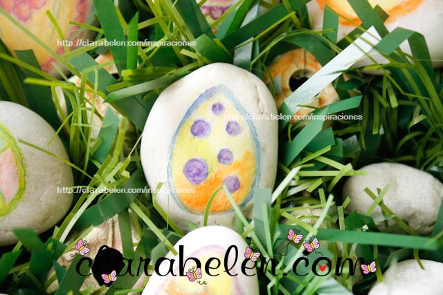 Huevos de Pascua con piedras pintadas para niños