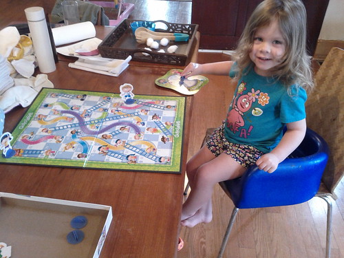 Our first time playing Chutes & Ladders, and she won!