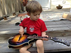 Leighton plays the mandolin on his uncle's porch in Texas by Guzilla