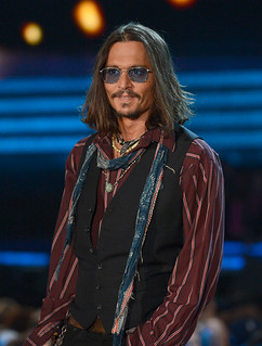 Johnny Depp in dark shades at the 55th Annual Grammy Awards