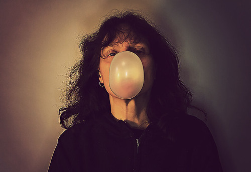 128) Blowing a bubble gum bubble