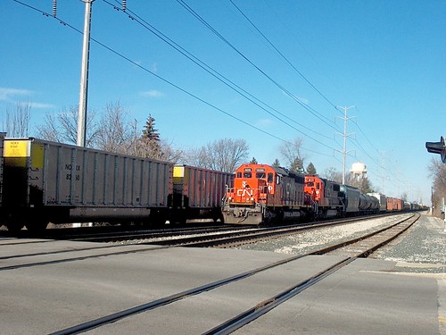 A southbound Canadian National freight train approaching the Harding Avenue railroad crossing.  La Grange Park Illinois.  January 2007. by Eddie from Chicago