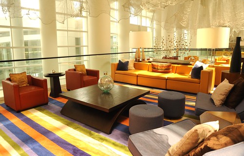 Lounge, contemporary design, yellow sofa, chairs, lamps, striped carpet, decor, interior, Renaisance Hotel, Schaumburg, Illinois, USA by Wonderlane
