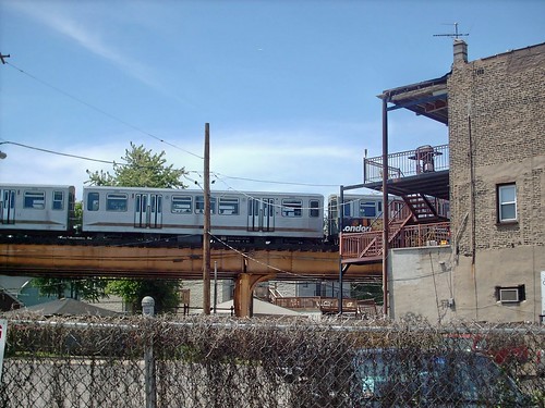 Outbound Chicago Transit Authority blue line train passing through Chicago's Logan Square neighborhood.  Chicago Illinois. July 2007. by Eddie from Chicago