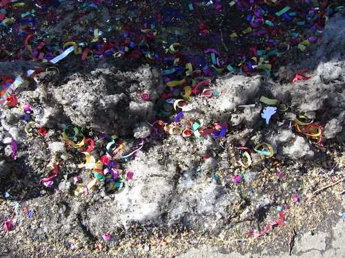 new year's confetti on old snow