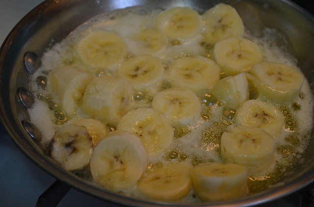 see bananas cooking in butter