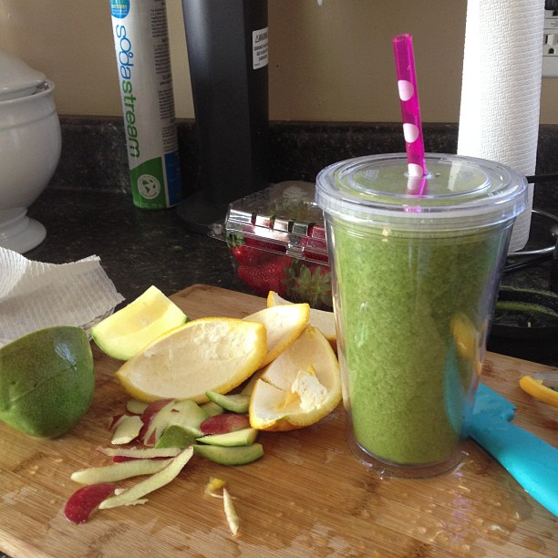Breakfast and cleaning this morning. (Smoothie: apple, orange, mango, kale, splash of almond milk) #greensmoothie
