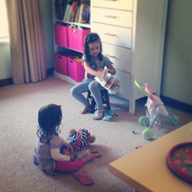 Story time at school... Love when these two play sweetly together! #latergram #sisters #mygirls
