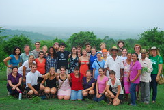 Group photo at Sembrandopaz farm, including MCC workers and Sembrandopaz organizers