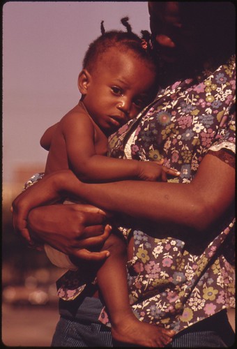 A South Side Chicago Ghetto Mother And Child Who Live In Nearby Low Income Housing, 06/1973