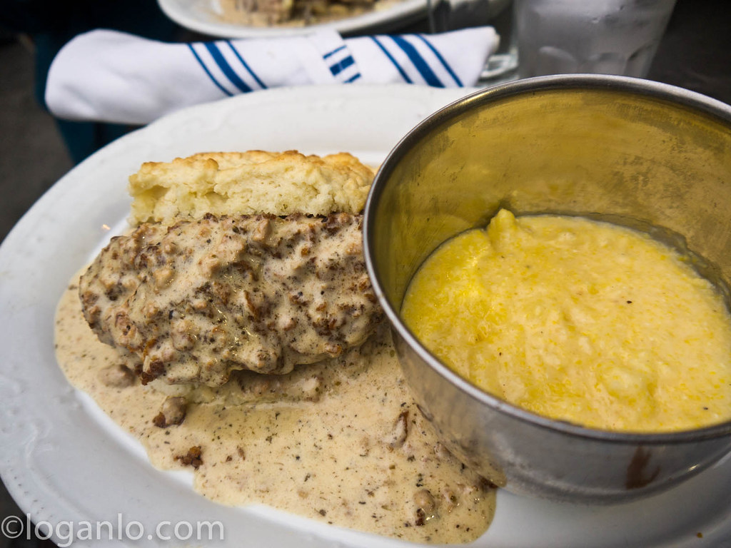 Smothered country fried chicken with cheesy grits at Jacob's Pickles in the UWS