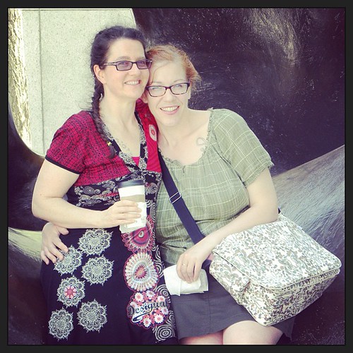 Alyx and @kellyoyo in the same hex at the Henry Miller statue outside AGO.