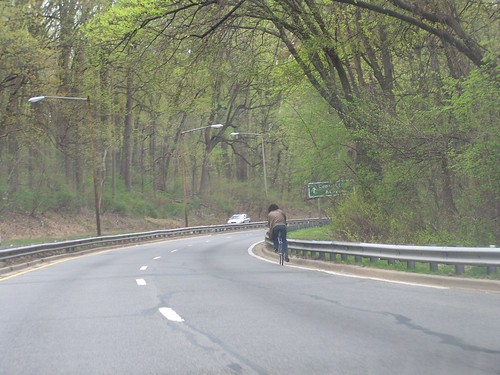 Bicyclist on Military Road NW in Rock Creek Park