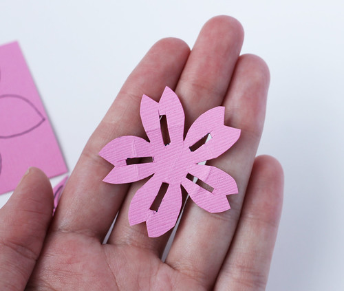Cutting flowers out of paper or felt