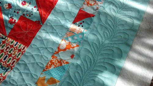 free motion quilting on summer stars quilt