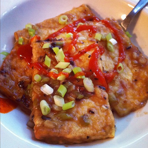 Garlic fried tofu in sesame oil with tamarind, scallions, sriracha. Feels good to cook again. #food #cooking #lunch