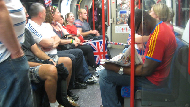 Londoners and Olympics fans intermingle on the Tube