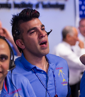 Mars Science Laboratory (MSL) Systems Engineer Bobak Ferdowsi is seen reacting after the MSL rover Curiosity successfully landed on Mars, Sunday, Aug. 5, 2012 at the Jet Propulsion Laboratory in Pasadena, Calif. Photo Credit: (NASA/Bill Ingalls)