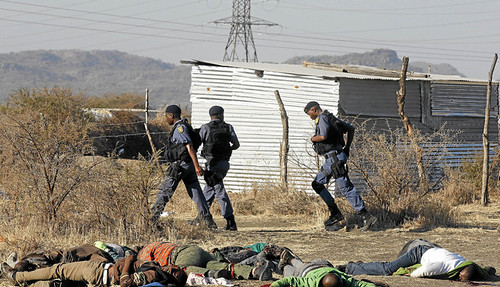 A massacre occured at the Lomnmin platinum mining area where 30 have been reported killed. Police opened fire on striking workers on August 16, 2012. by Pan-African News Wire File Photos