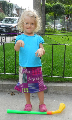 she's wearing a skirt! Yay!  This is the Oliver + S Music Class skirt from stashed Echino