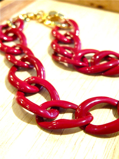 We love all things enamel, especially this lipstick red enamel chain link necklace! Signed "Monet".