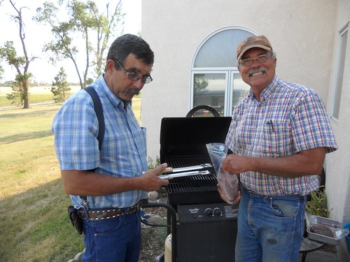 Dad and Carl grilling