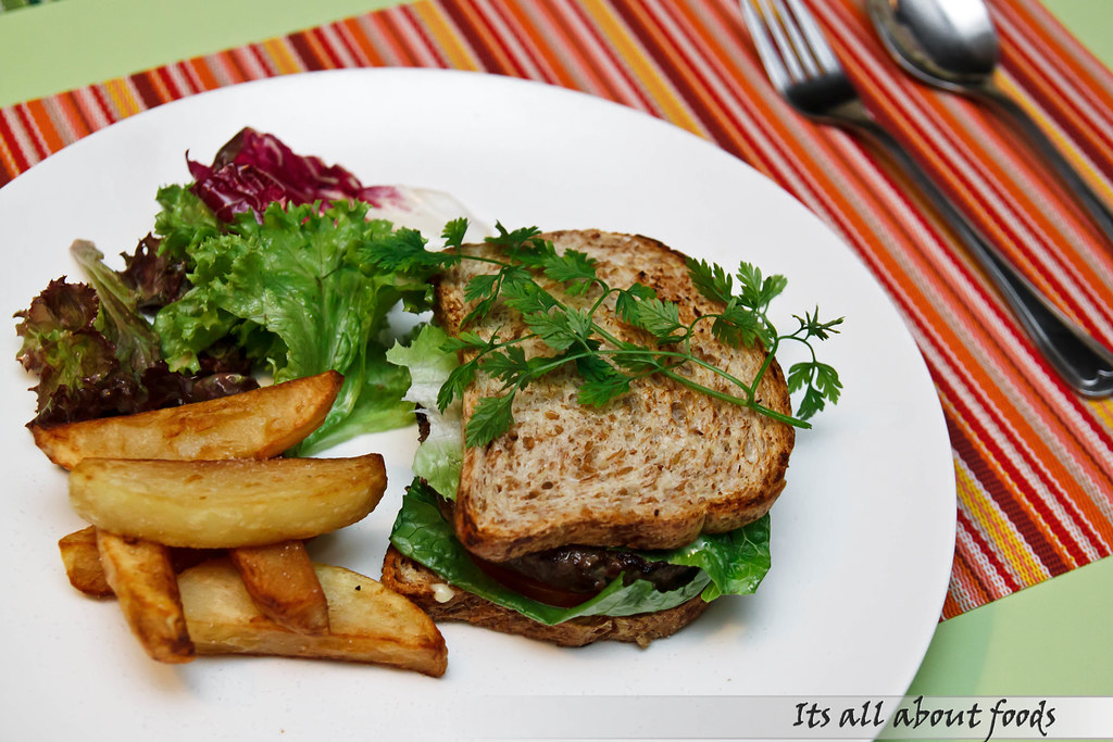 beef-burger-with-home-made-french-fries-salad-croisette-cafe