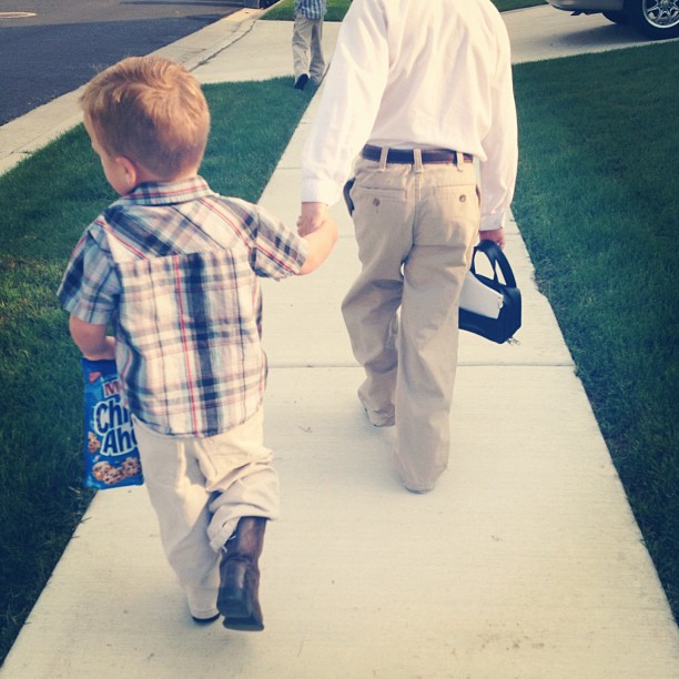 A typical Draper migration to church. All the boys in cowboy boots, with at least one (sometimes 2) pant legs tucked in to boot. Oh, and a bag of cookies for breakfast ;). Mo says, 'fix their pants.' I say 'leave it, these moments are precious'. Love my f