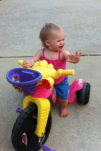 Lucy taking the big wheel for a test spin.