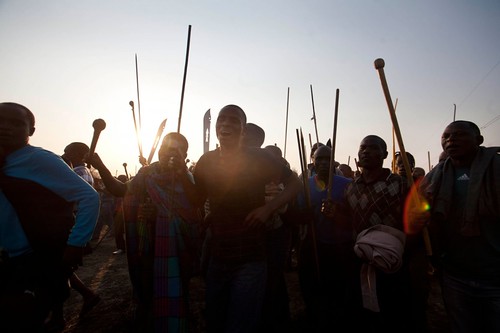 South African workers armed with traditional weapons are in a dispute over union representation and salaries. Police opened fire on strikers resulting in over 30 reported deaths. by Pan-African News Wire File Photos