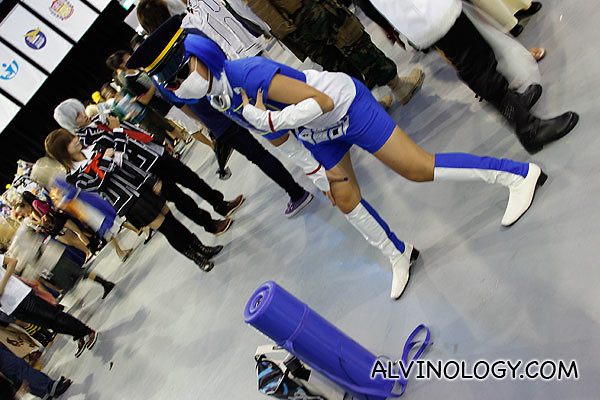 Cosplayer with yoga mat